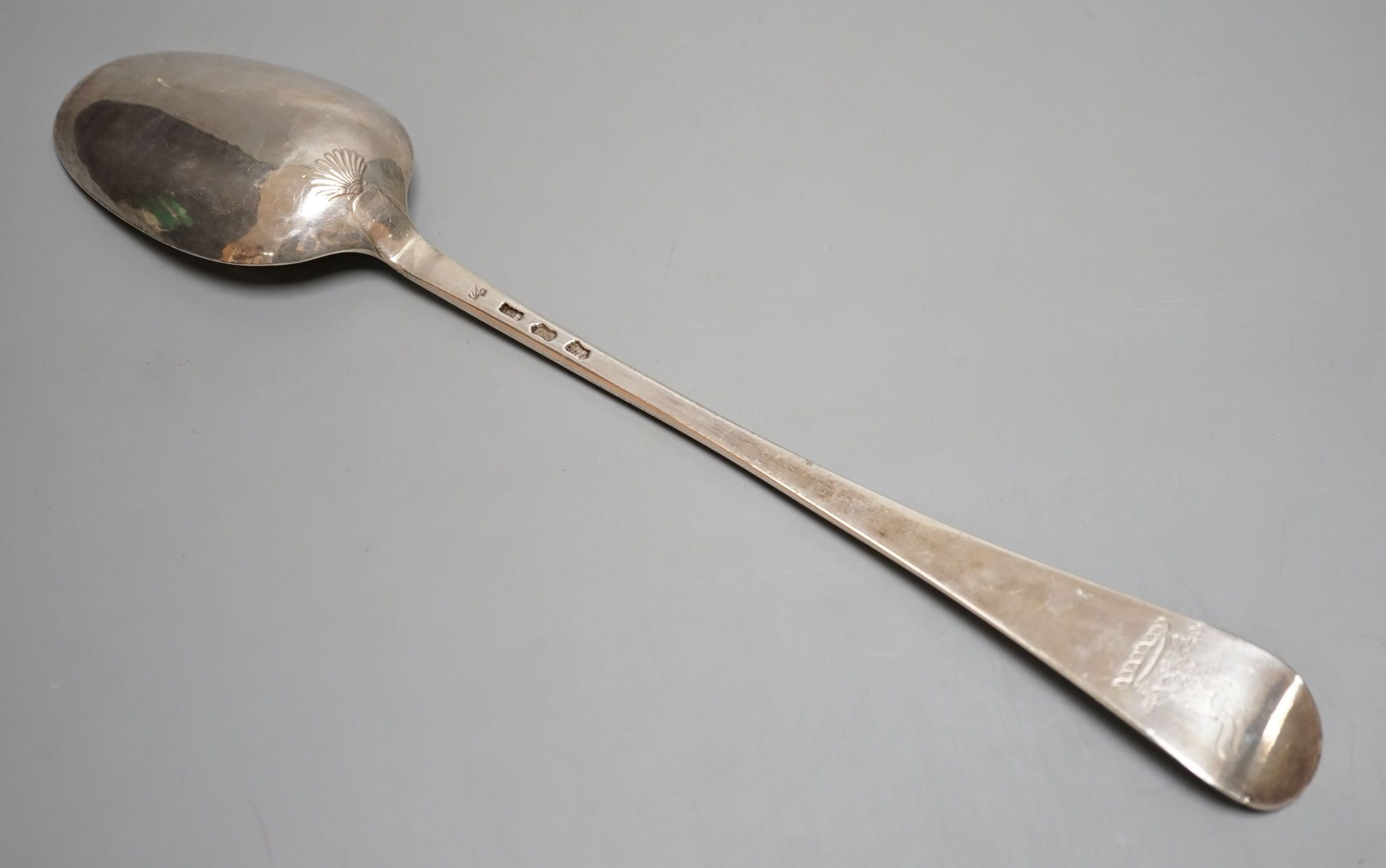 A George II silver Hanovarian pattern hash spoon spoon, makers mark worn, possibly John Harvey I?, with shell back bowl, London, 1742, 36cm